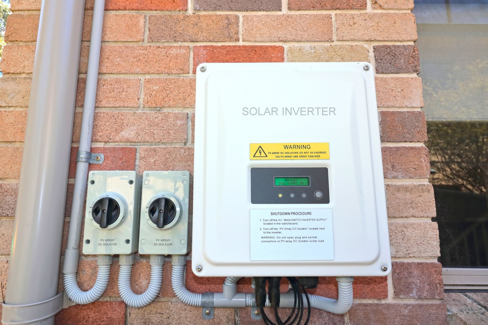 Solar inverter on outside wall