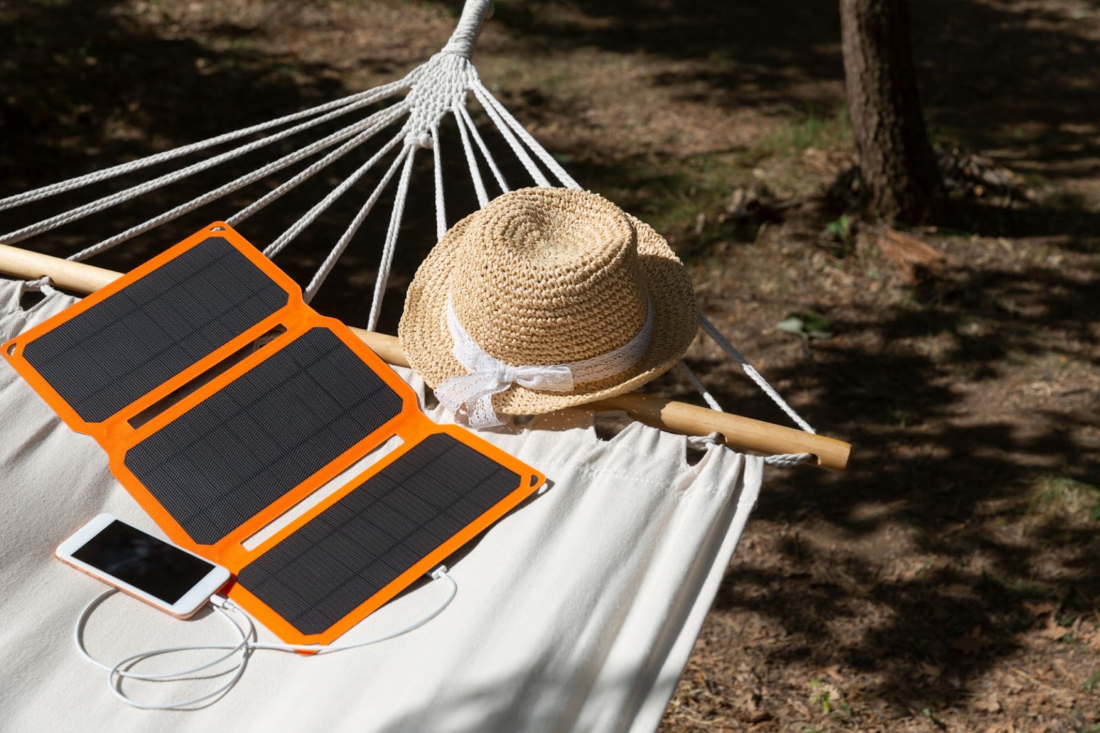 Portable solar panels laying on a hammock